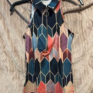 Sheilay sleeveless zip up top.